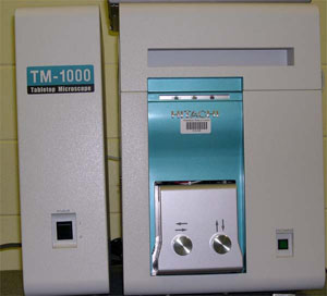 A picture of the HITACHI TM-1000 Table-Top SEM